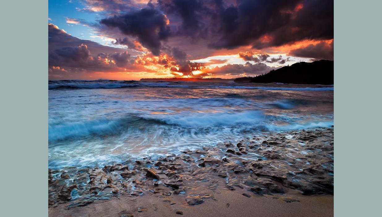 Kauai Sunrise shore rocks.jpg